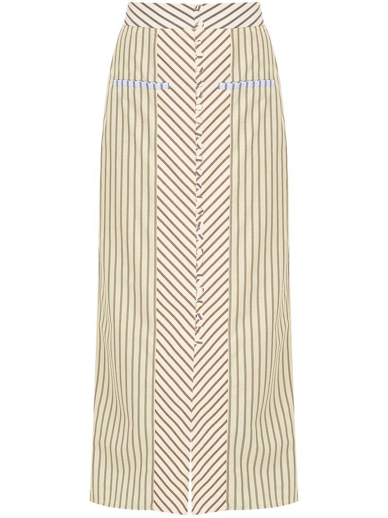 Woman in striped halter top and maxi skirt set