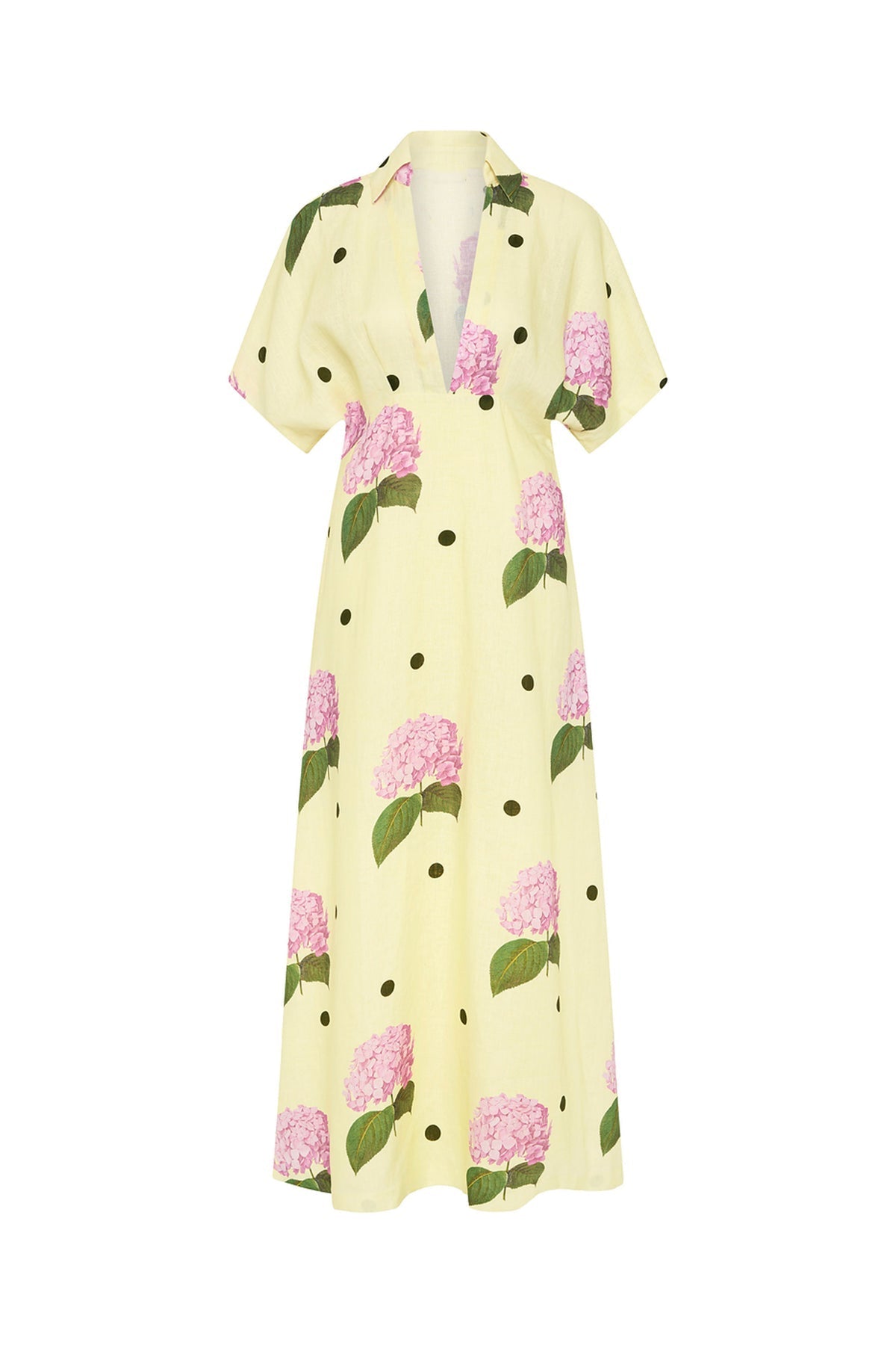 Woman in yellow linen maxi dress with pink hydrangea print