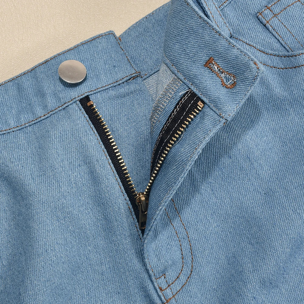 Back view of light wash denim shorts with large bow detail