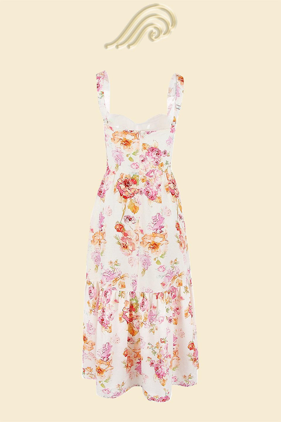 Woman in floral print sundress leaning on stone wall