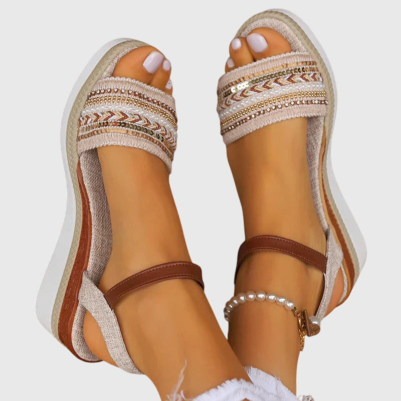 White/Brown - Women's open-toe wedge sandals featuring a breathable canvas upper, intricate beaded embroidery across the front strap, an adjustable faux-leather ankle strap, and a layered shock-absorbing sole.