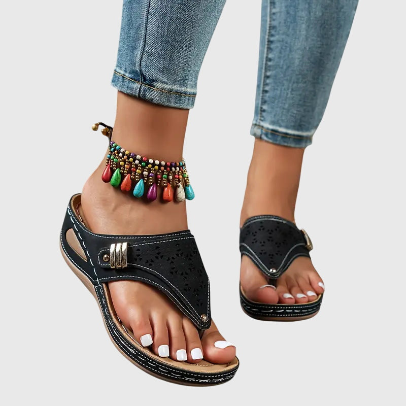 Khaki - Faux-leather wedge sandals featuring laser-cut upper detailing, a decorative side buckle, contoured stitched footbed, and contrast stitching along the sole
