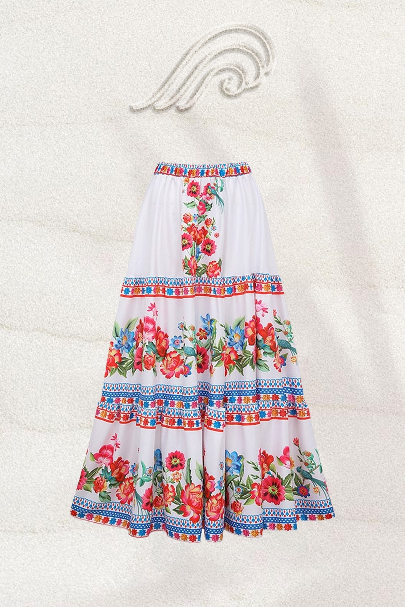 Woman in white floral print swimsuit with ruffled sleeves