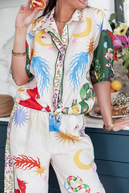 Woman wearing ivory linen pajama set with celestial print