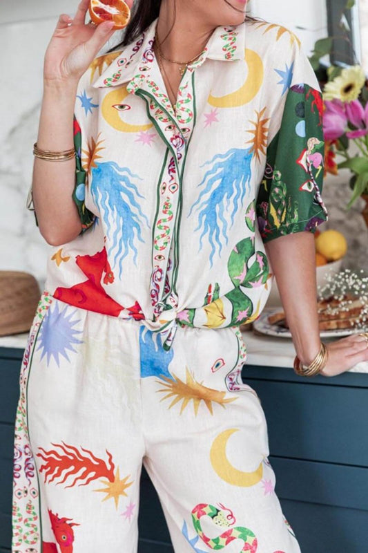 Woman wearing ivory linen pajama set with celestial print