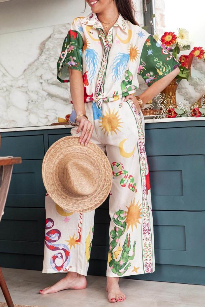 Woman wearing ivory linen pajama set with celestial print