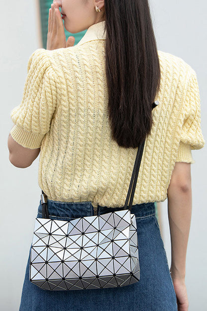 Ivory geometric shoulder bag with black strap