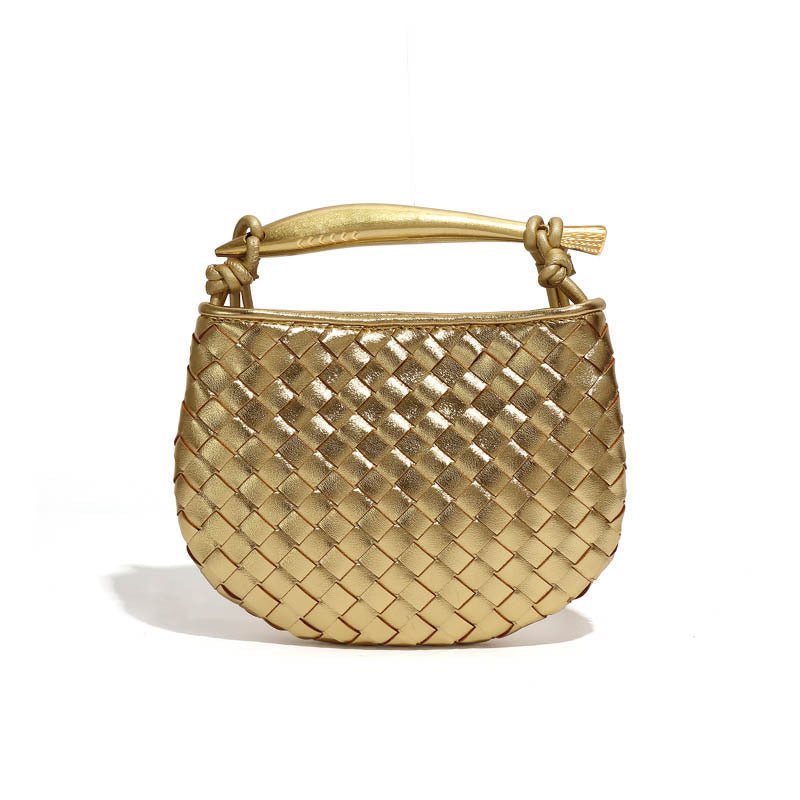 Silver woven leather top handle bag with gold hardware
