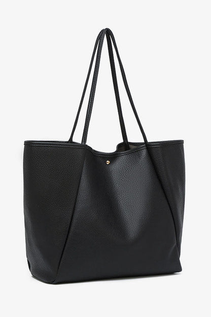 Black faux leather tote bag with shoulder straps