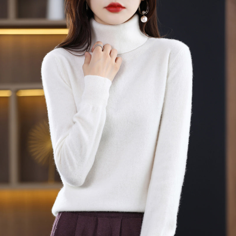 Woman wearing light blue cashmere turtleneck sweater