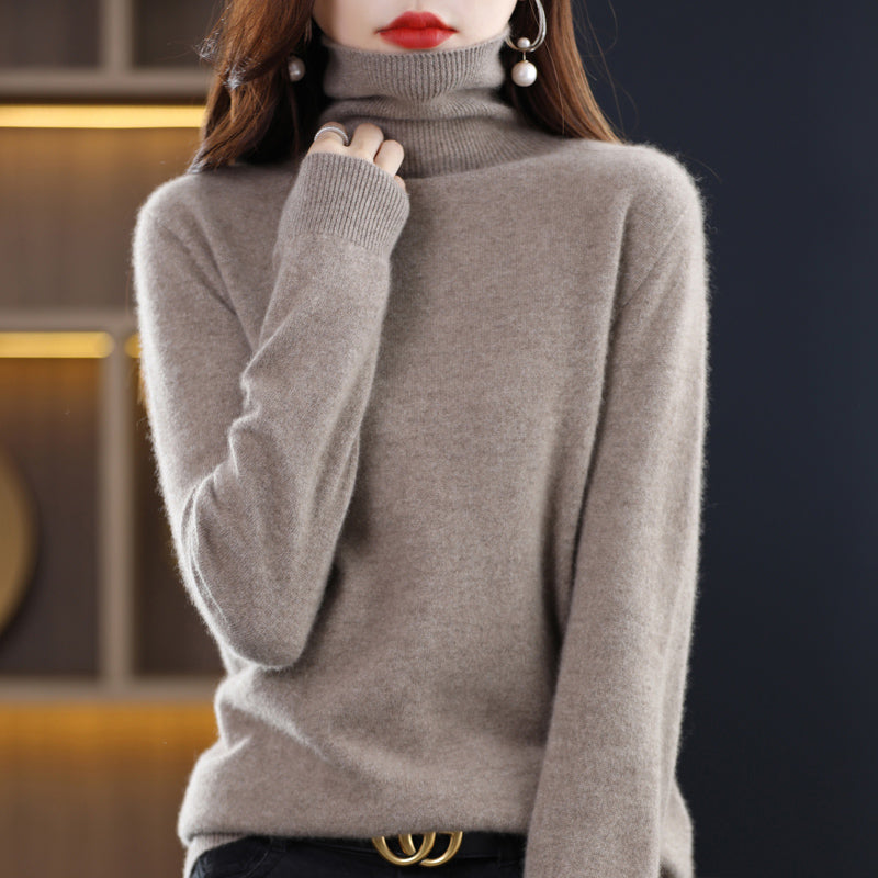 Woman wearing light blue cashmere turtleneck sweater
