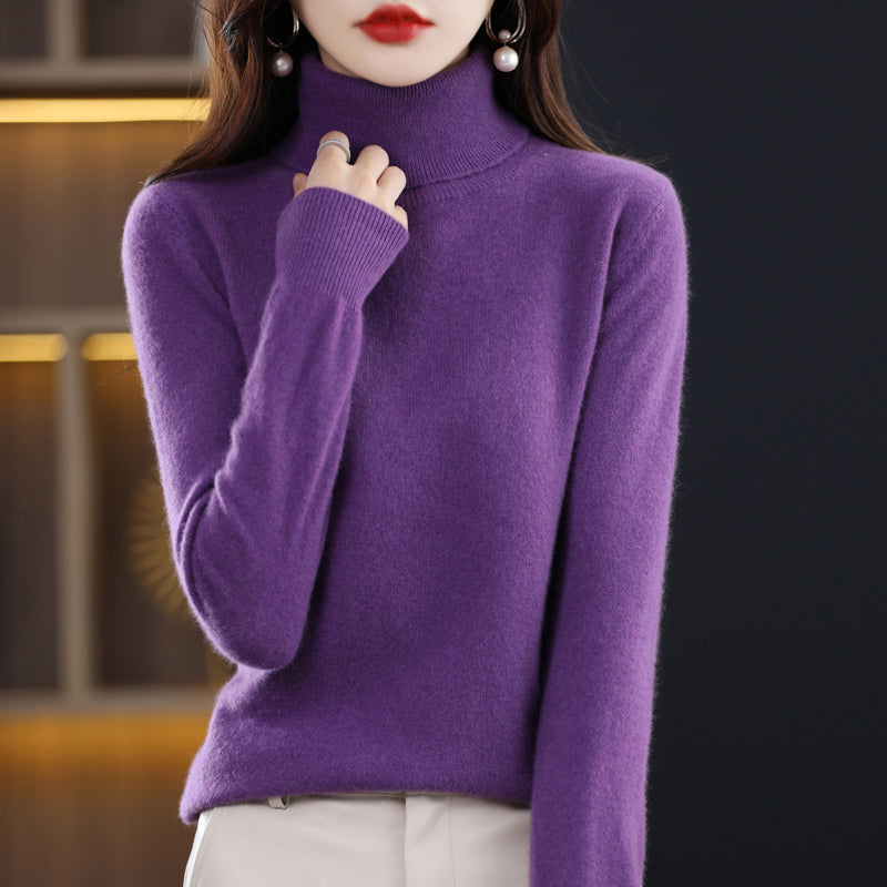 Woman wearing light blue cashmere turtleneck sweater