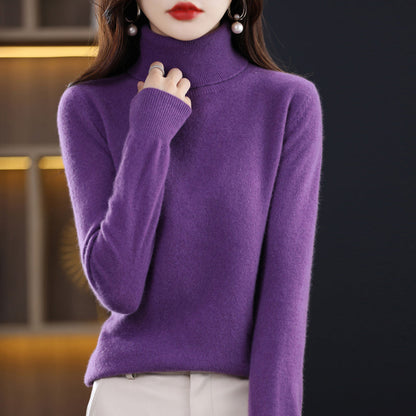 Woman wearing light blue cashmere turtleneck sweater