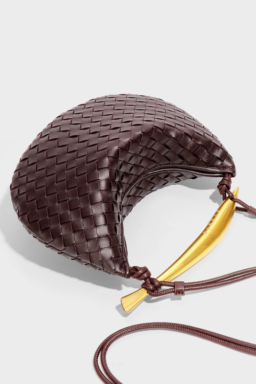 Woven brown leather hobo bag with gold handle