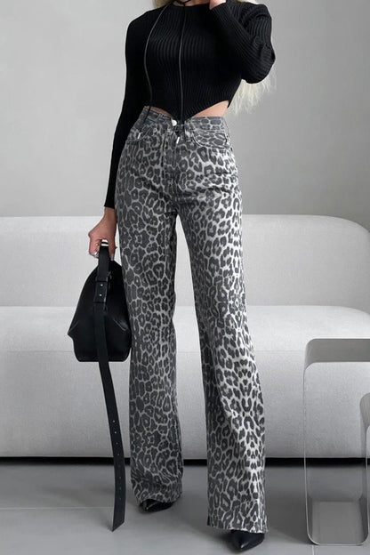 Woman in gray leopard print wide leg jeans and white ribbed knit top