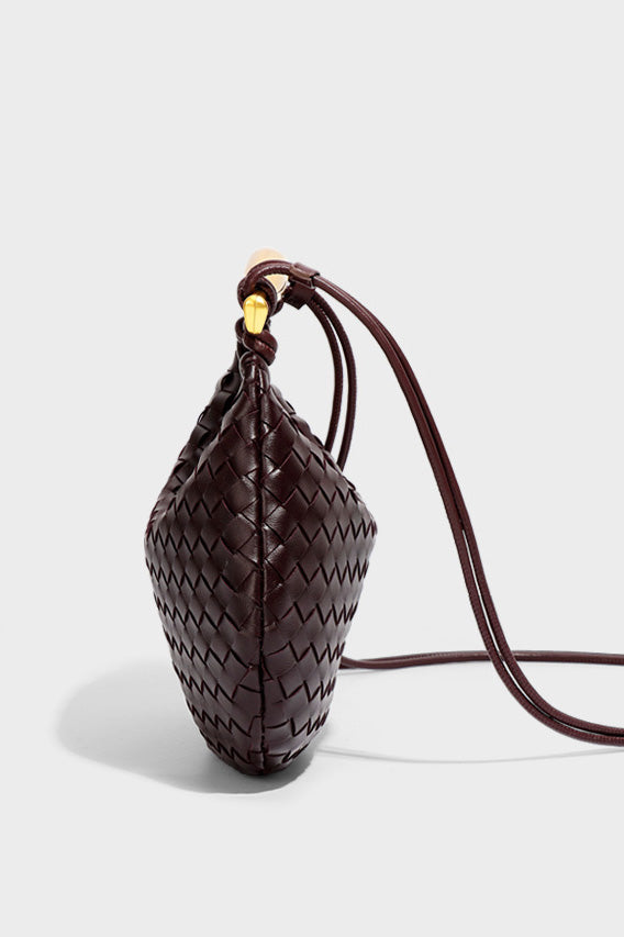 Woven brown leather hobo bag with gold handle