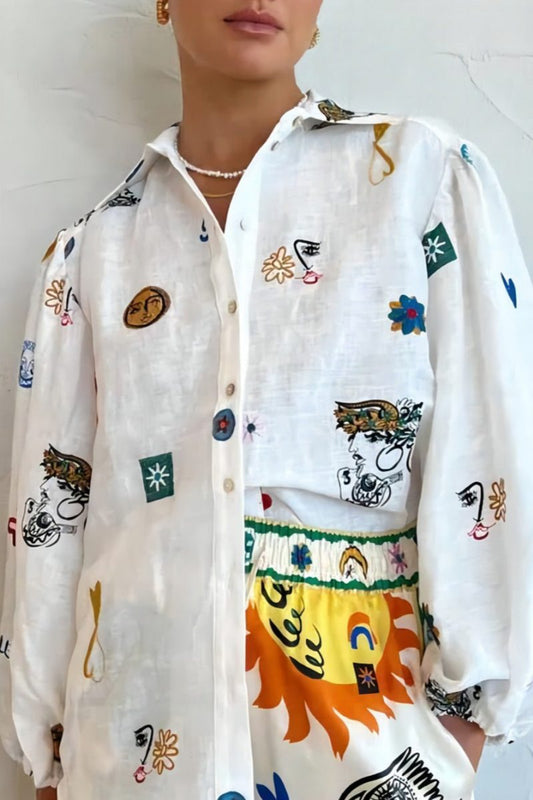 Woman wearing a white linen shirt with colorful artistic prints