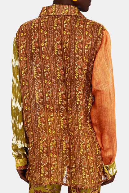 Woman wearing patchwork linen shirt and pants
