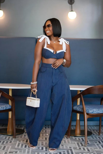 Woman in blue and white striped two-piece set