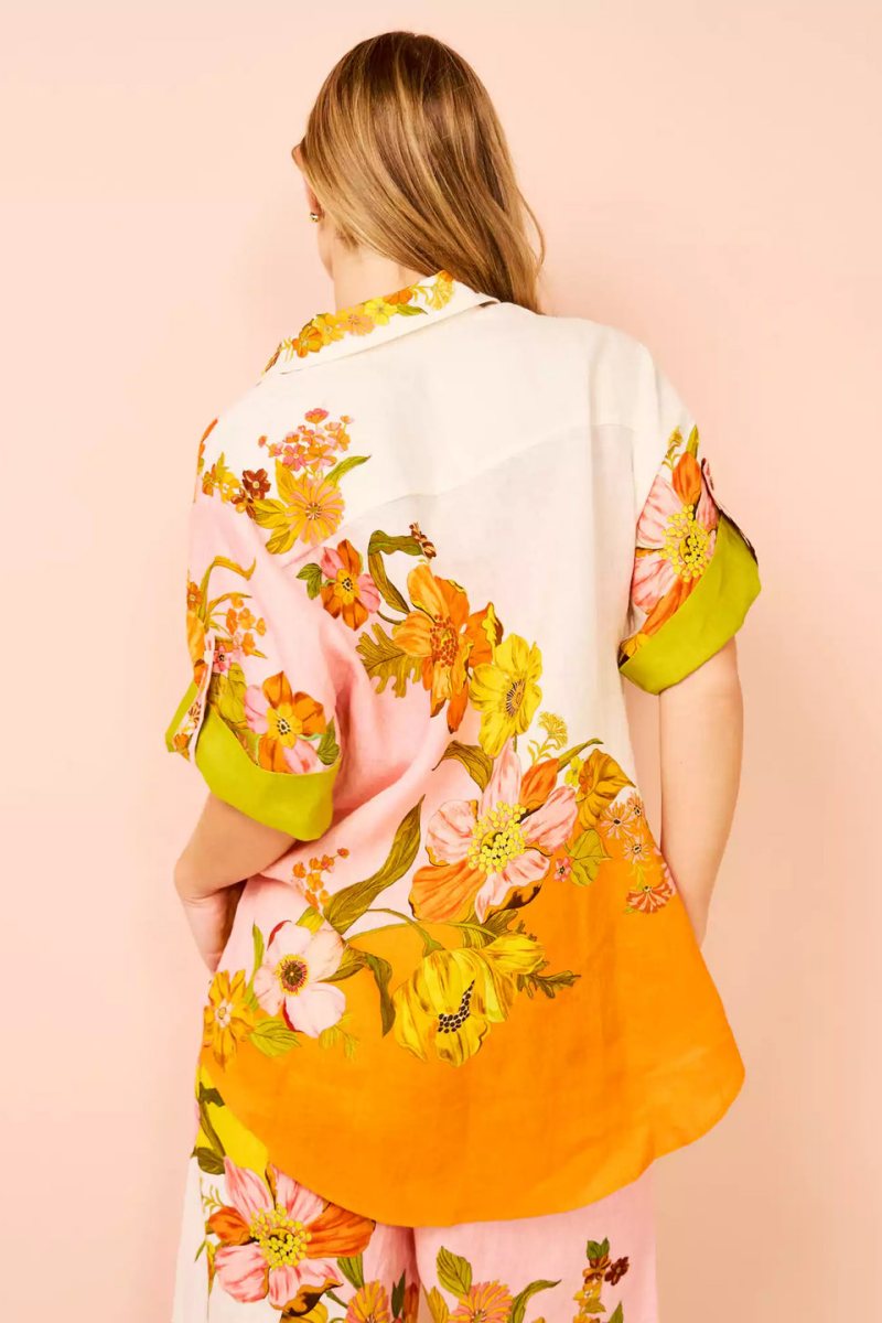 Woman in colorful floral linen pant set