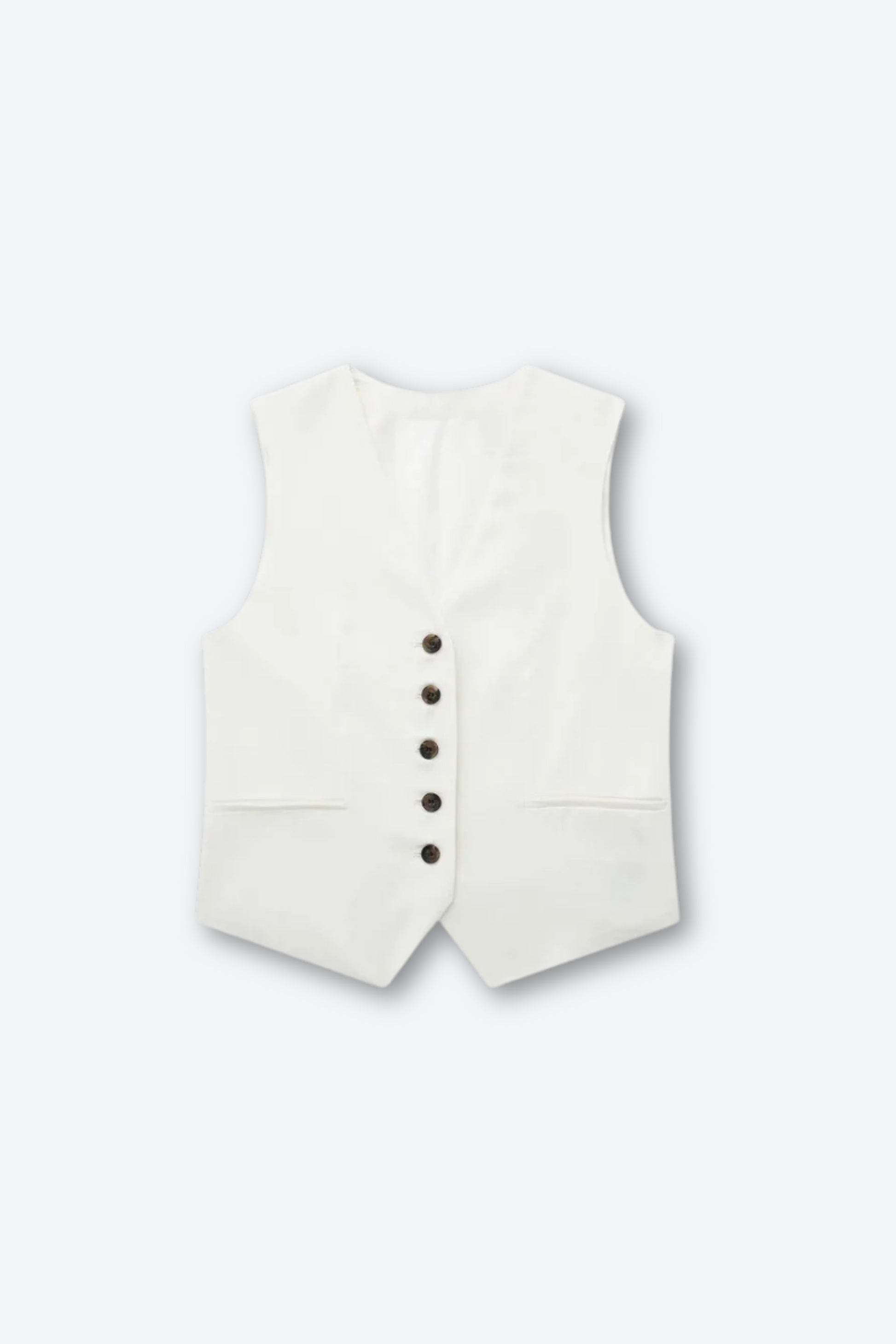 Woman wearing white linen vest and shorts set