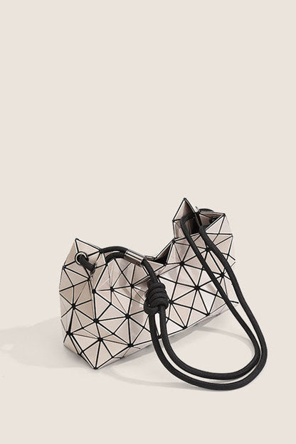 Ivory geometric shoulder bag with black strap