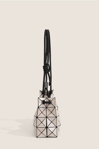 Ivory geometric shoulder bag with black strap