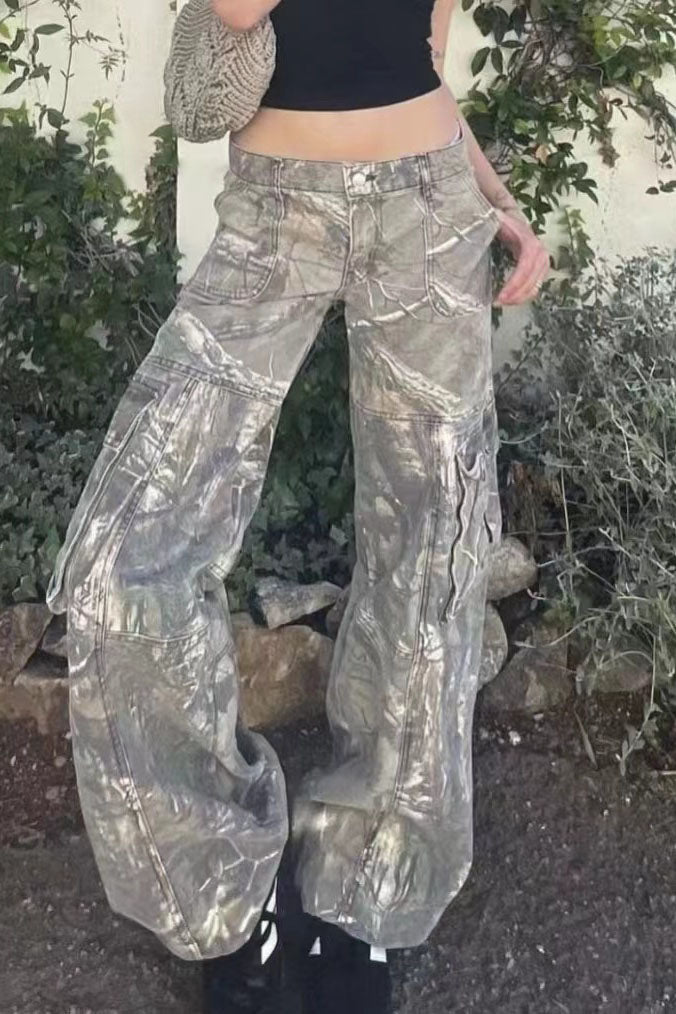 Camouflage print cargo pants with wide legs and low rise.