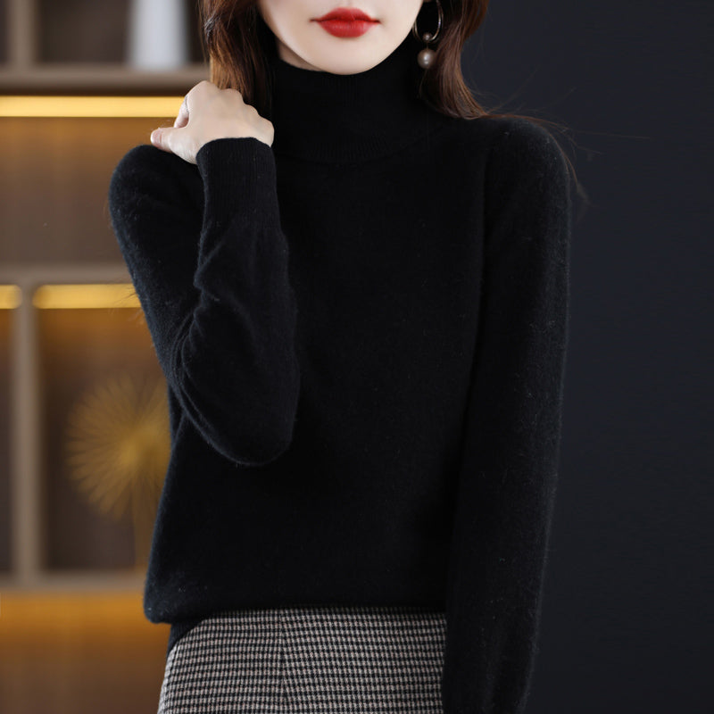 Woman wearing light blue cashmere turtleneck sweater