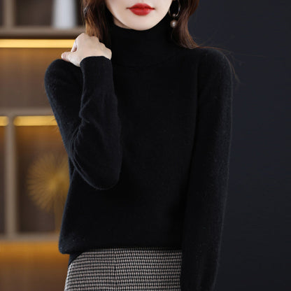 Woman wearing light blue cashmere turtleneck sweater