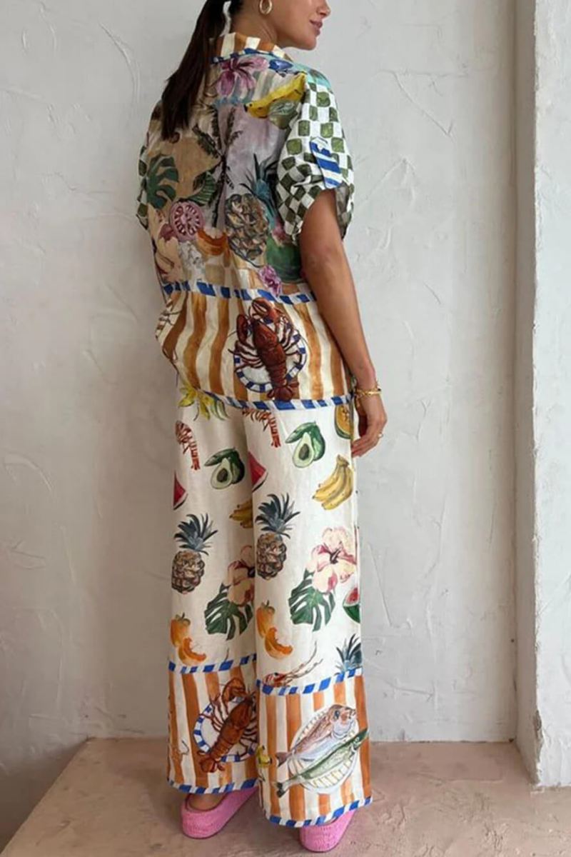 Woman wearing a tropical fruit print linen two-piece set with pink platform sandals