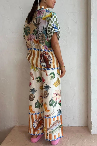 Woman wearing a tropical fruit print linen two-piece set with pink platform sandals