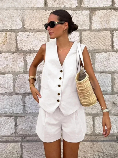 Woman wearing white linen vest and shorts set