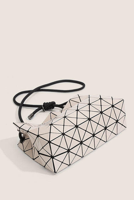 Ivory geometric shoulder bag with black strap