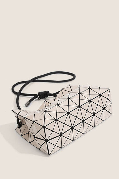 Ivory geometric shoulder bag with black strap