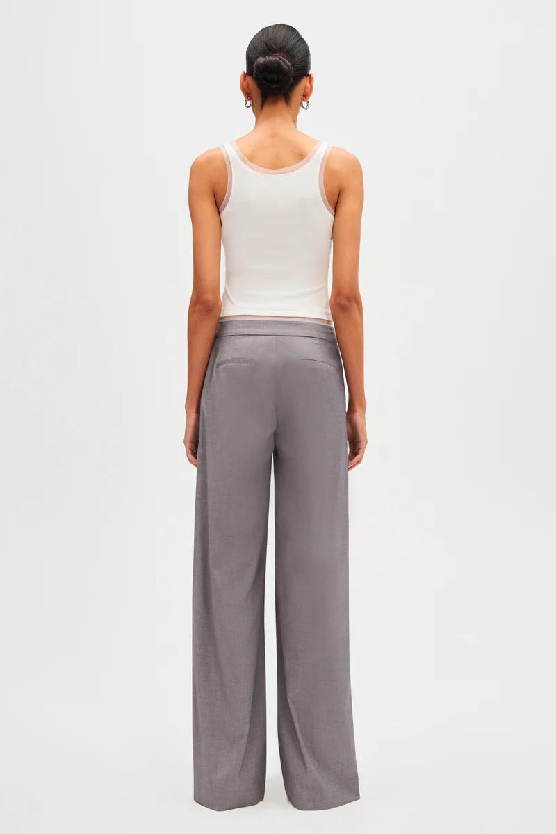 Woman in gray wool blend pant suit