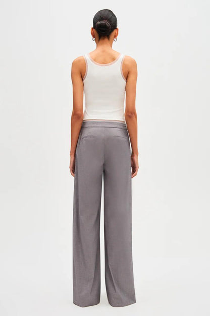 Woman in gray wool blend pant suit