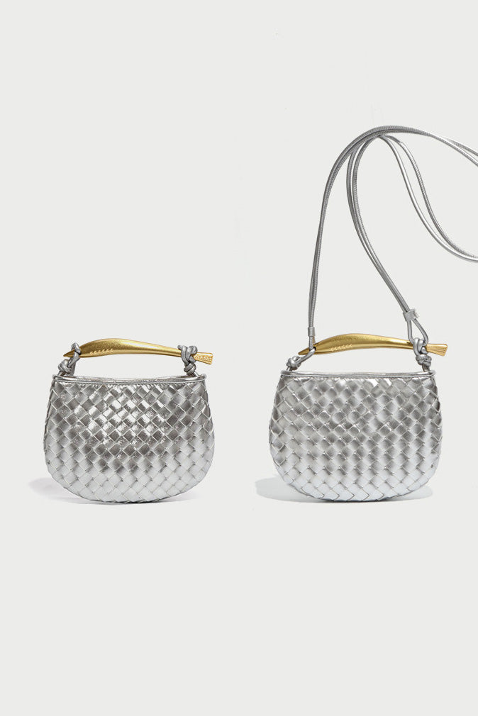 Silver woven leather top handle bag with gold hardware