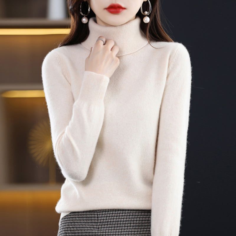 Woman wearing light blue cashmere turtleneck sweater
