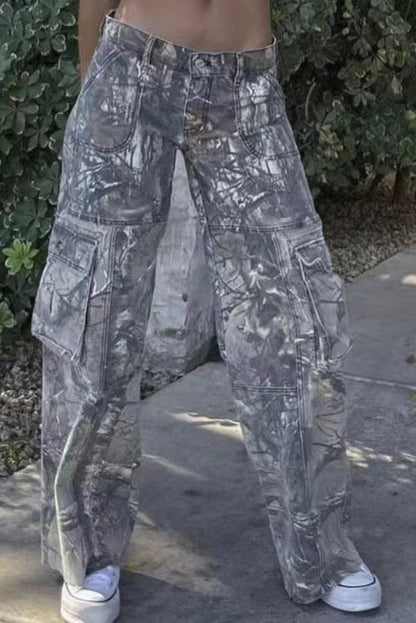 Camouflage print cargo pants with wide legs and low rise.