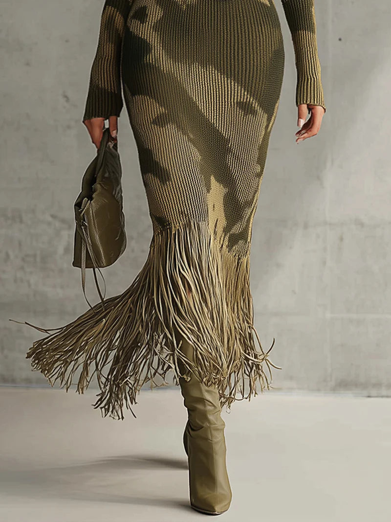 Woman in olive green camo print knit dress with fringe hem