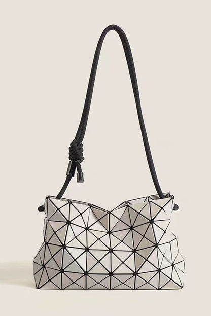Ivory geometric shoulder bag with black strap
