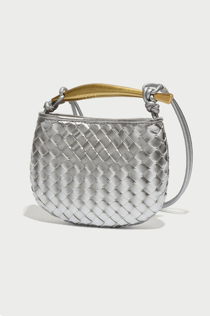 Silver woven leather top handle bag with gold hardware