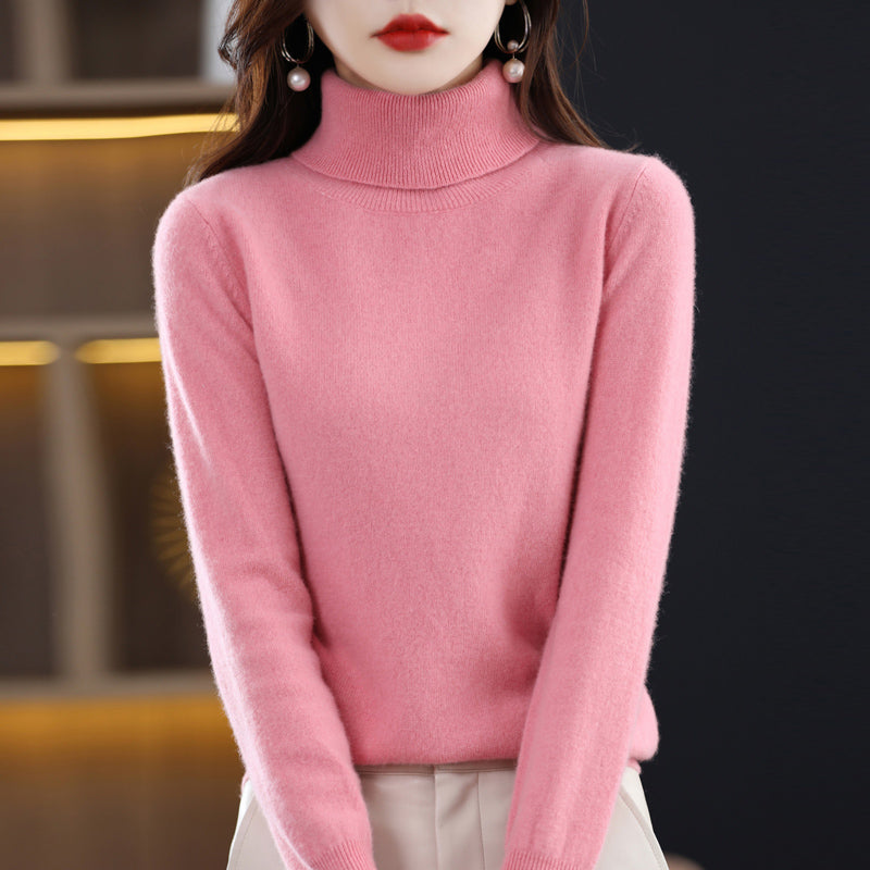 Woman wearing light blue cashmere turtleneck sweater
