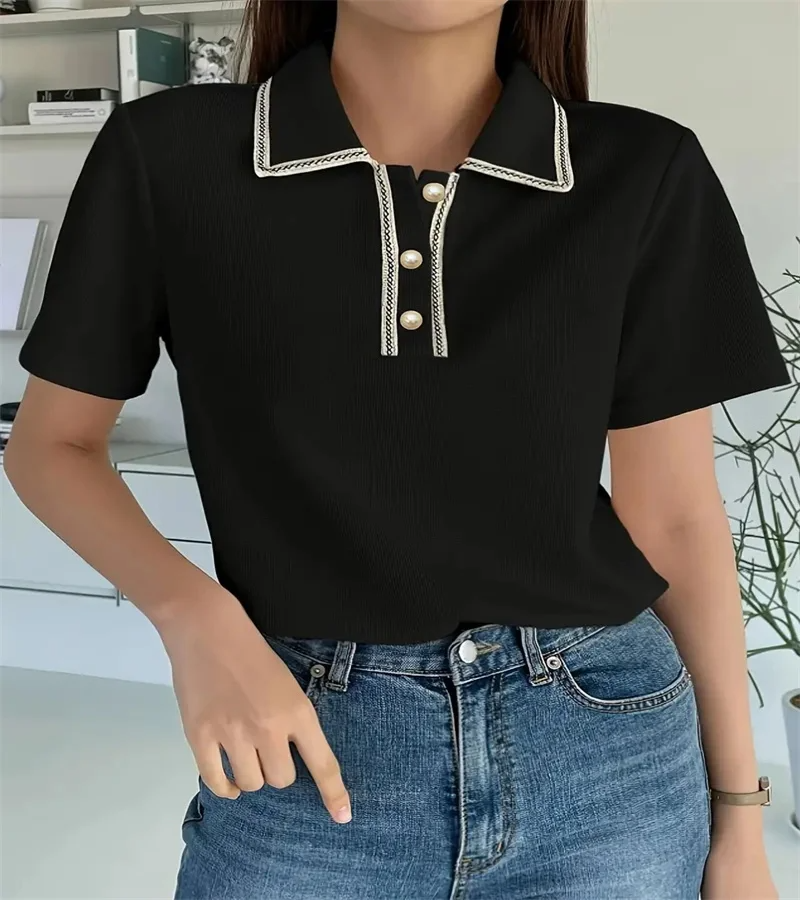 Woman wearing off-white ribbed knit polo shirt with pearl buttons.