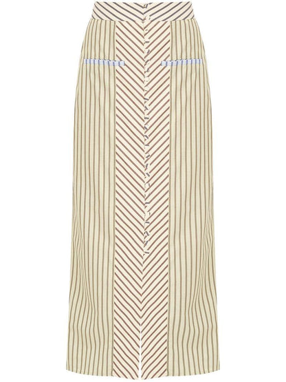 Woman in striped halter top and maxi skirt set