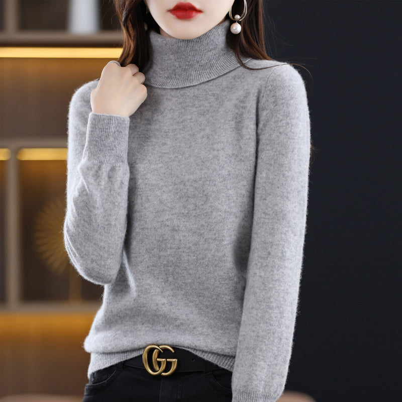 Woman wearing light blue cashmere turtleneck sweater
