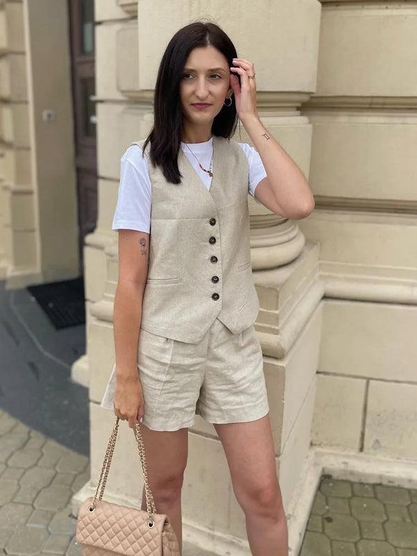 Woman wearing white linen vest and shorts set