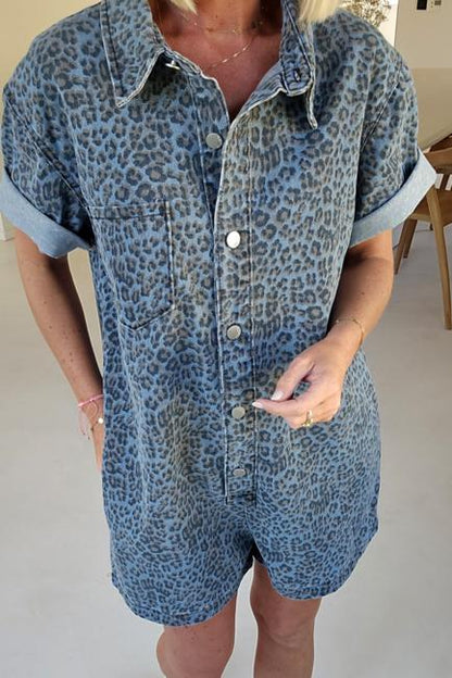 Woman wearing a blue leopard print denim romper.