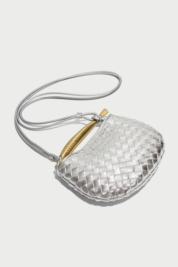 Silver woven leather top handle bag with gold hardware